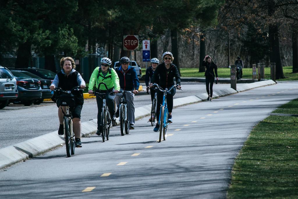 join together to bike outside