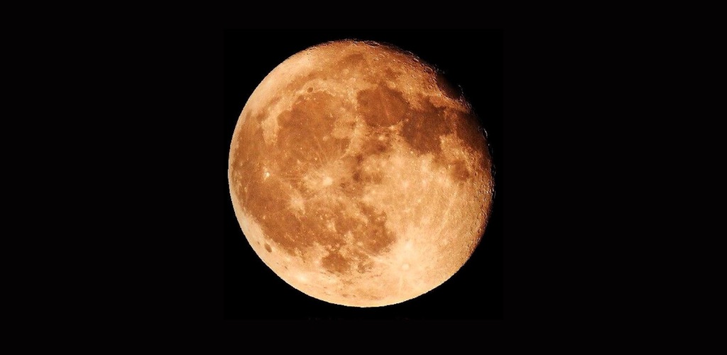 Full Supermoon shining over a peaceful landscape on October 6, 2025
