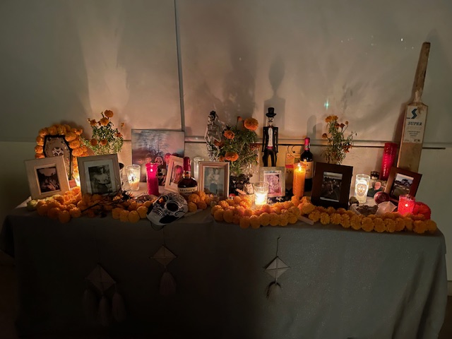 Our family takes great care in building the altar to honor our lost ones during Day of the Dead