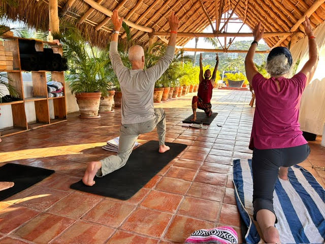 Jonathane teaching yoga classes as a source of healing in Sayulita